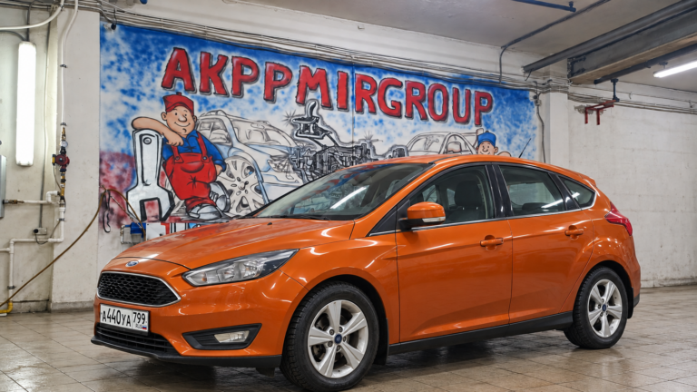 Оранжевый Ford Focus — ремонт PowerShift